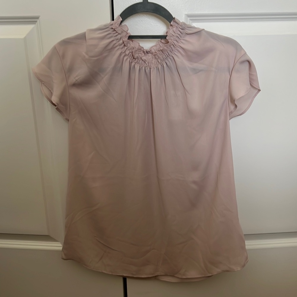 Express medium size light pink short sleeve blouse. Flutter sleeves